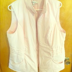 A lightweight pink puff vest